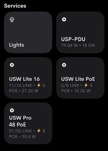 Crestron Home iOS Services screen showing live UniFi USW switch tiles alongside lighting and power management